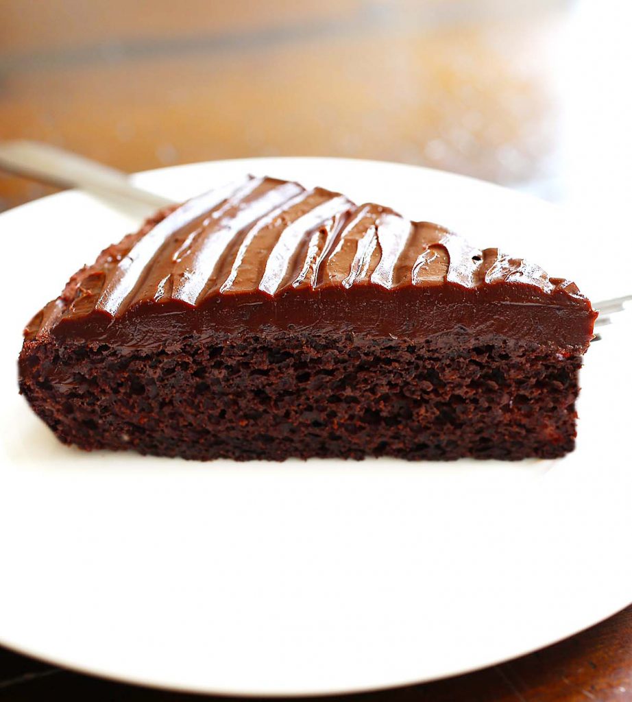 Shiny chocolate frosting on cake. 