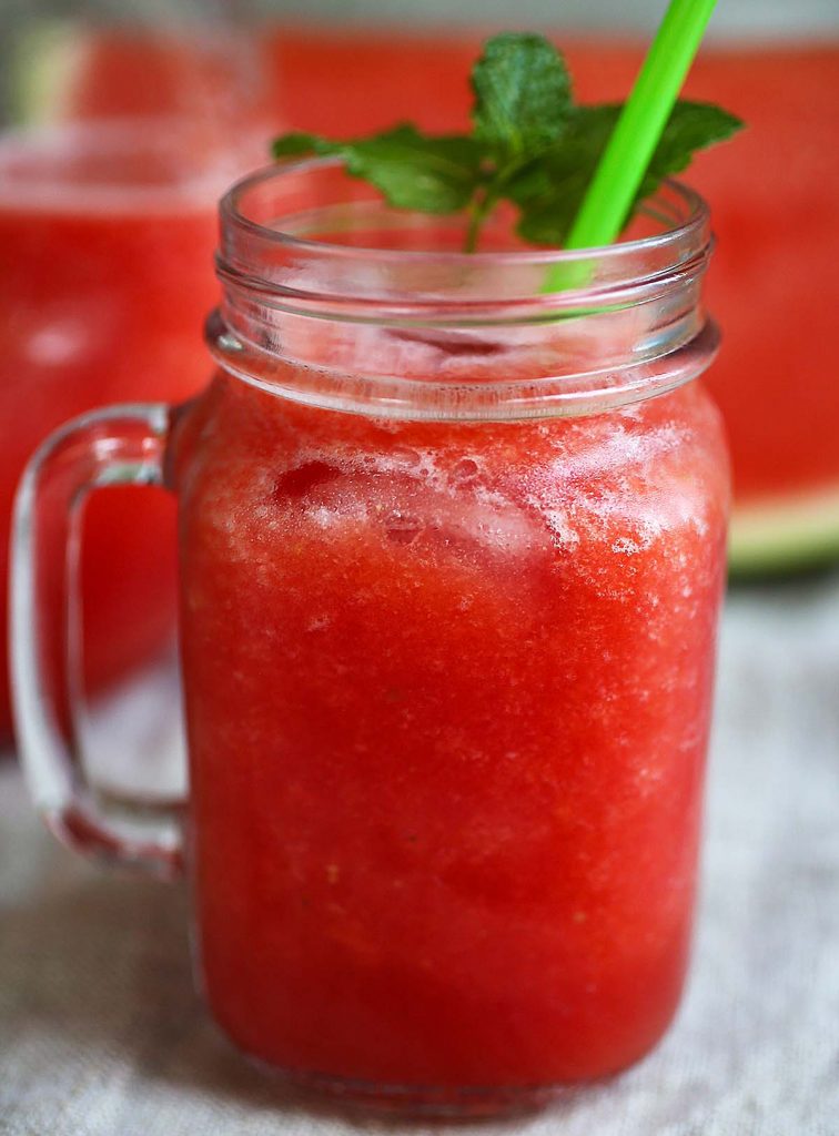 Watermelon juice in mason jar.