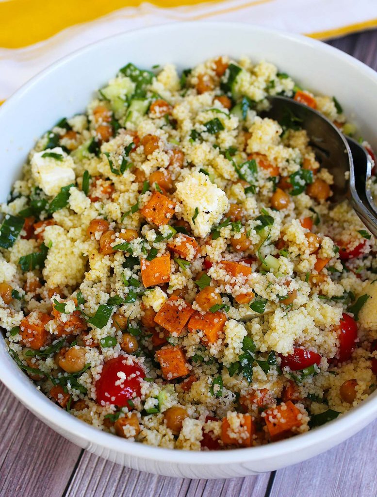 Couscous salad with sweet potatoes, cucumbers and feta cheese.