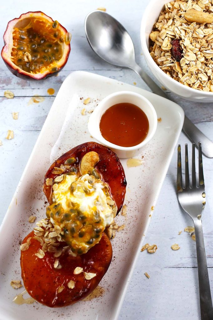 Grilled Peach with Passion Fruit with yogurt and homemade granola. 