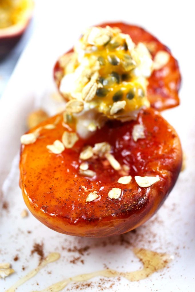 Grilled Peach with Passion Fruit and yogurt on top.