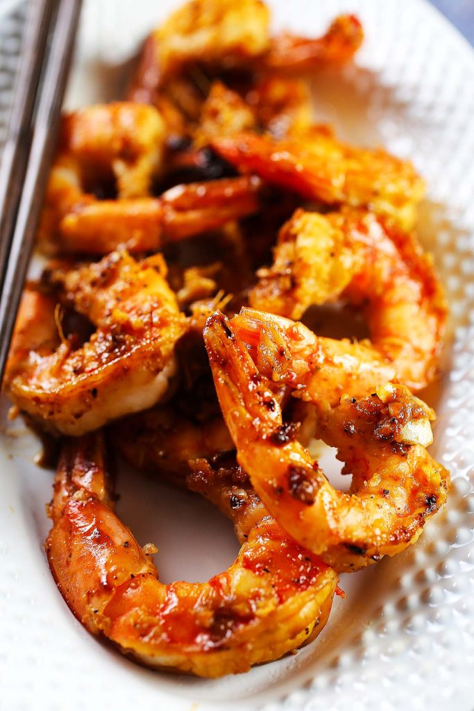 Spicy honey grilled shrimp on plate.