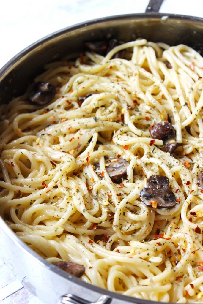 Mushroom pasta with chili flakes and dried parsley. 