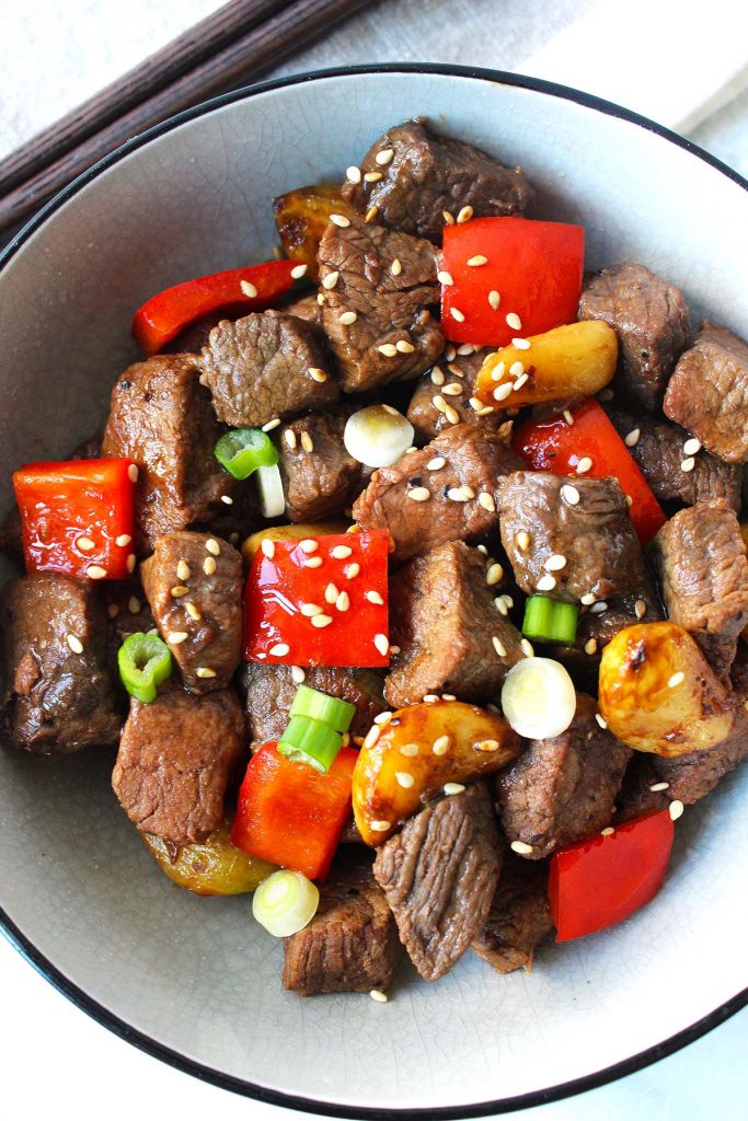 Garlic and beef stir fry in a bowl.