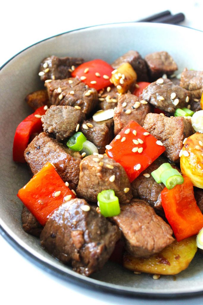 Garlic and beef stir fry in a bowl.